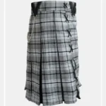 Leather kilt with tartan pattern, black lacing, and chain accessory, perfect for traditional Scottish attire or modern kilt fashion.